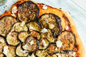 Vegetarian pizza with roasted vegetables and Provence AOP olive oil