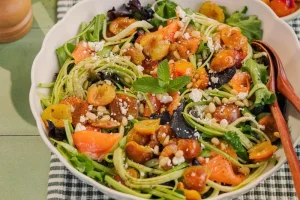 Zucchini spaghetti and mirabelle plum salad