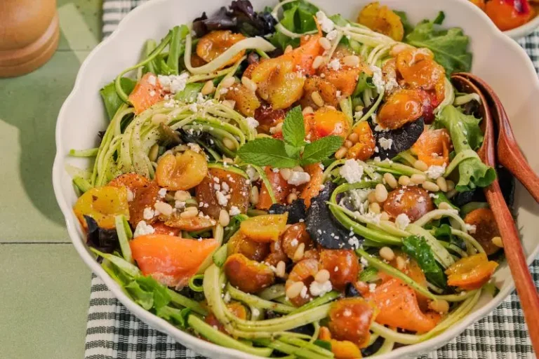 Zucchini spaghetti and mirabelle plum salad