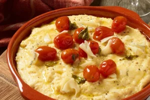 Polenta with Morbier and candied tomatoes