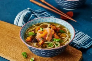 Ramen with smoked salmon, sweet potatoes and eggplant