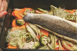 Sea bass fillet and vegetables with tahini