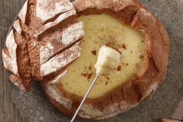 Morbier fondue in a bread ball